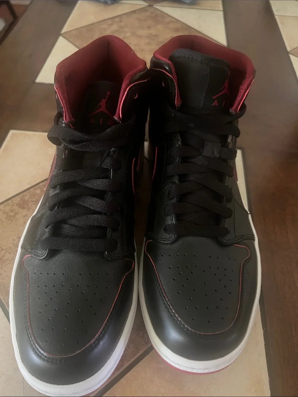 Jordan Black and Red Mid/High-Top Sneakers